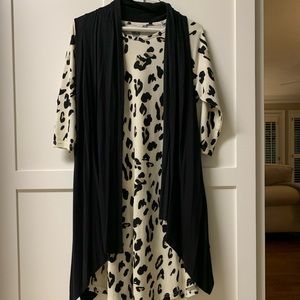 Leopard print with black vest.